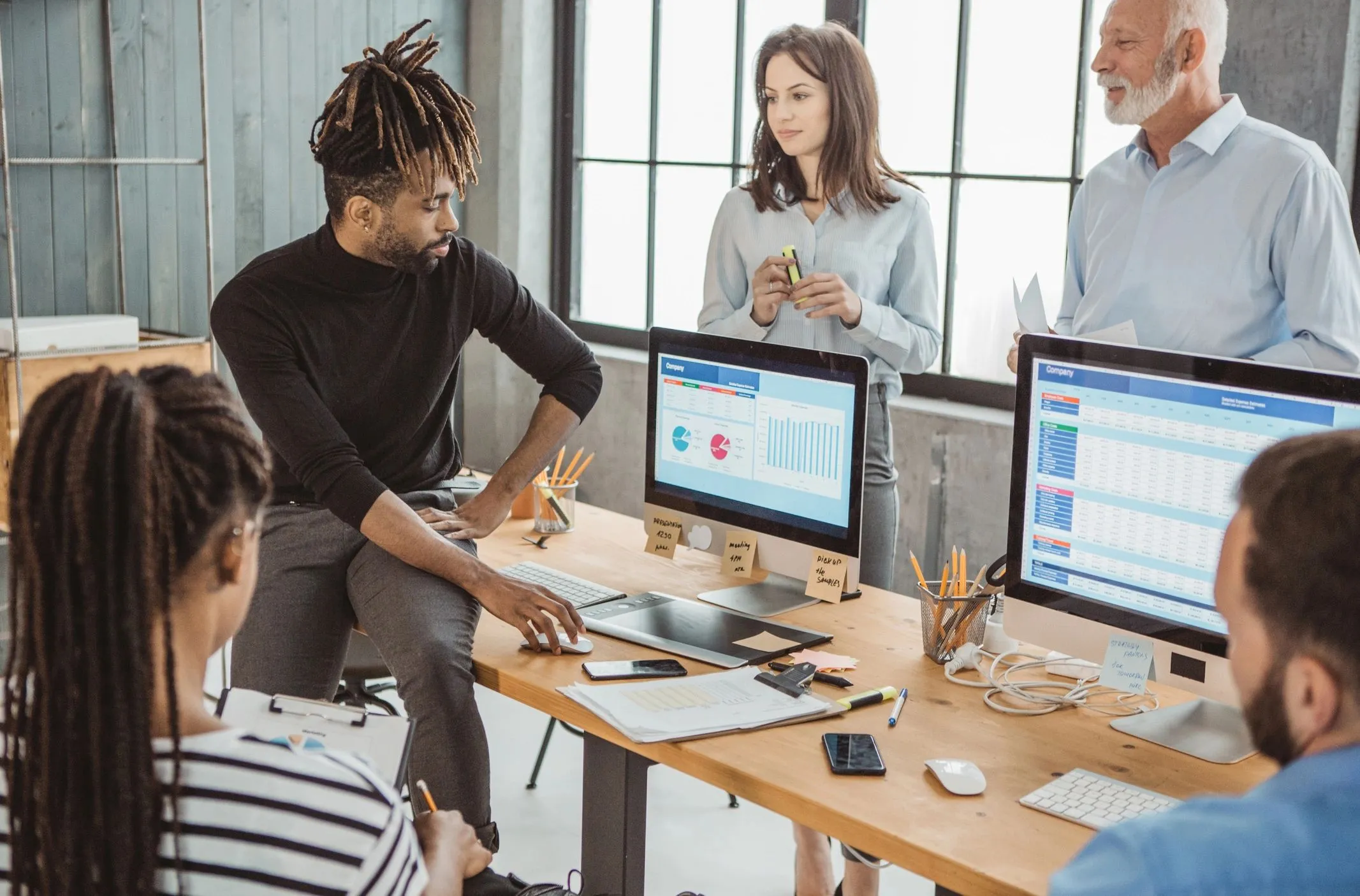 diverse team working online marketing modern office