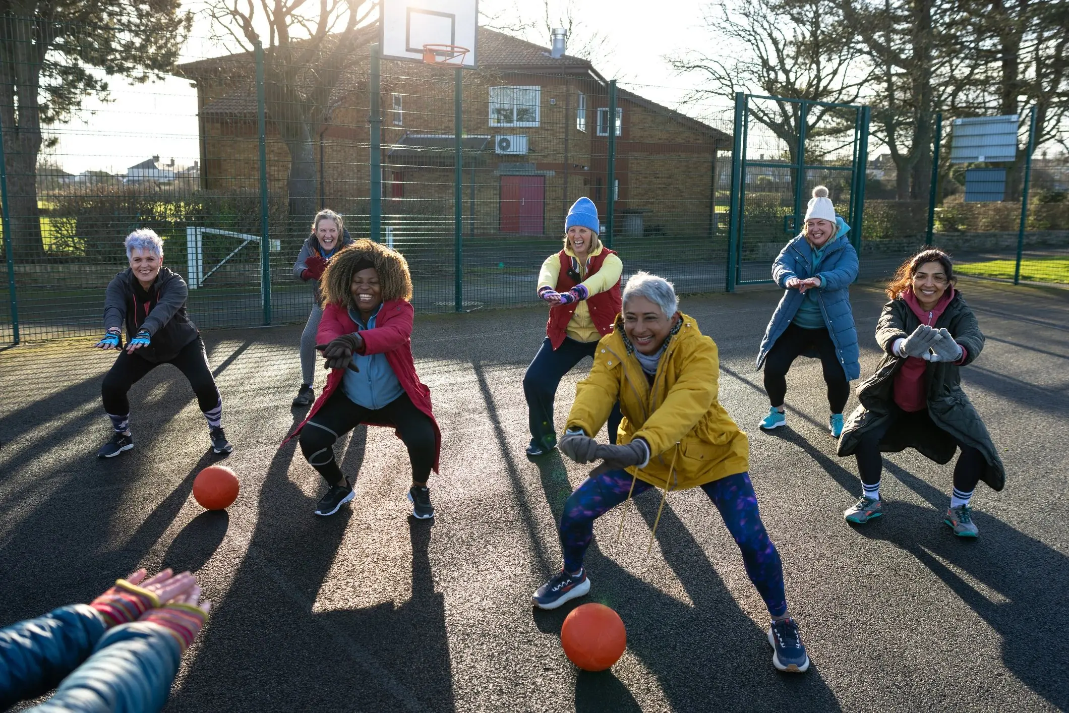 Women warming up outdoors for fitness