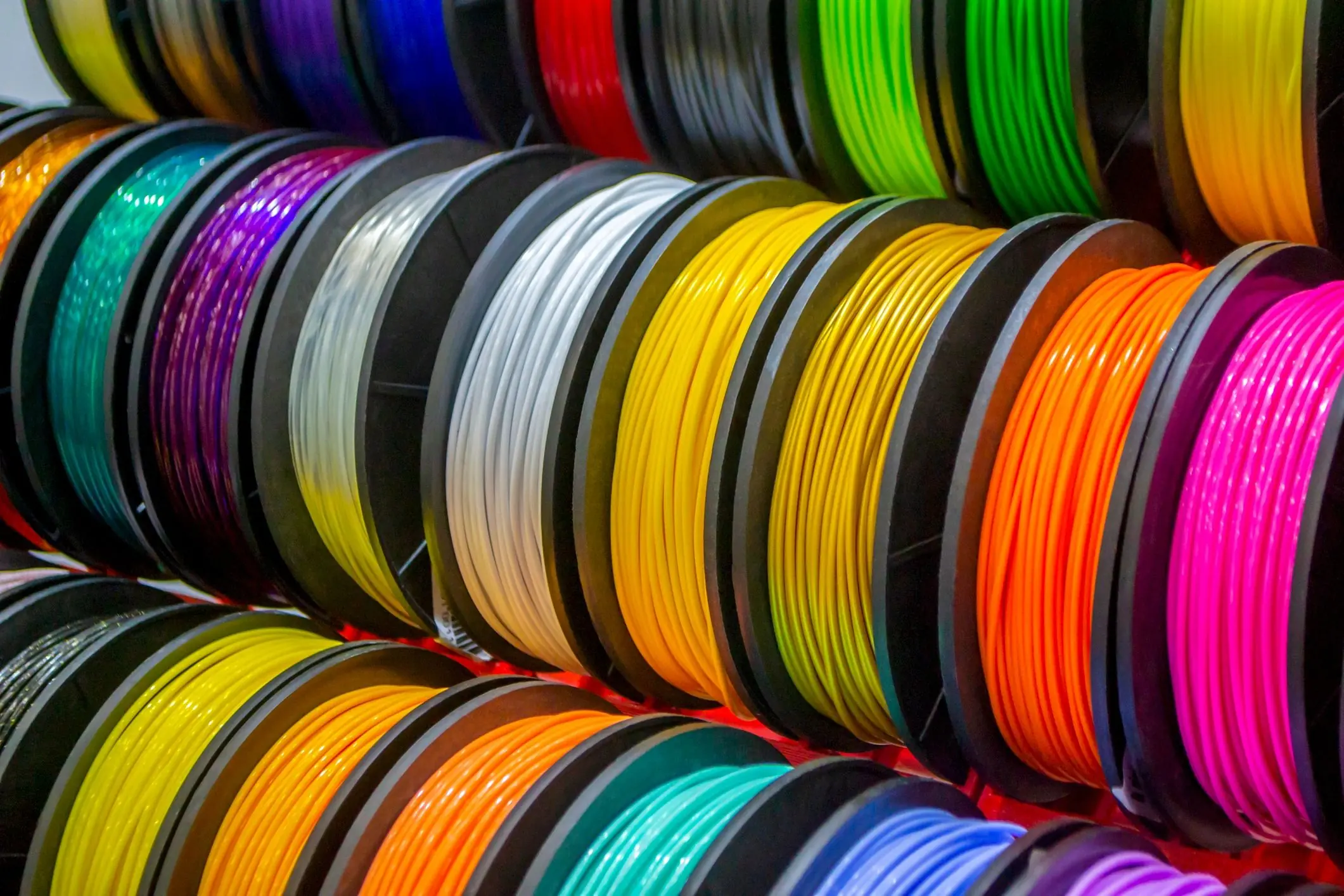 Colorful 3D printing filament spools close up