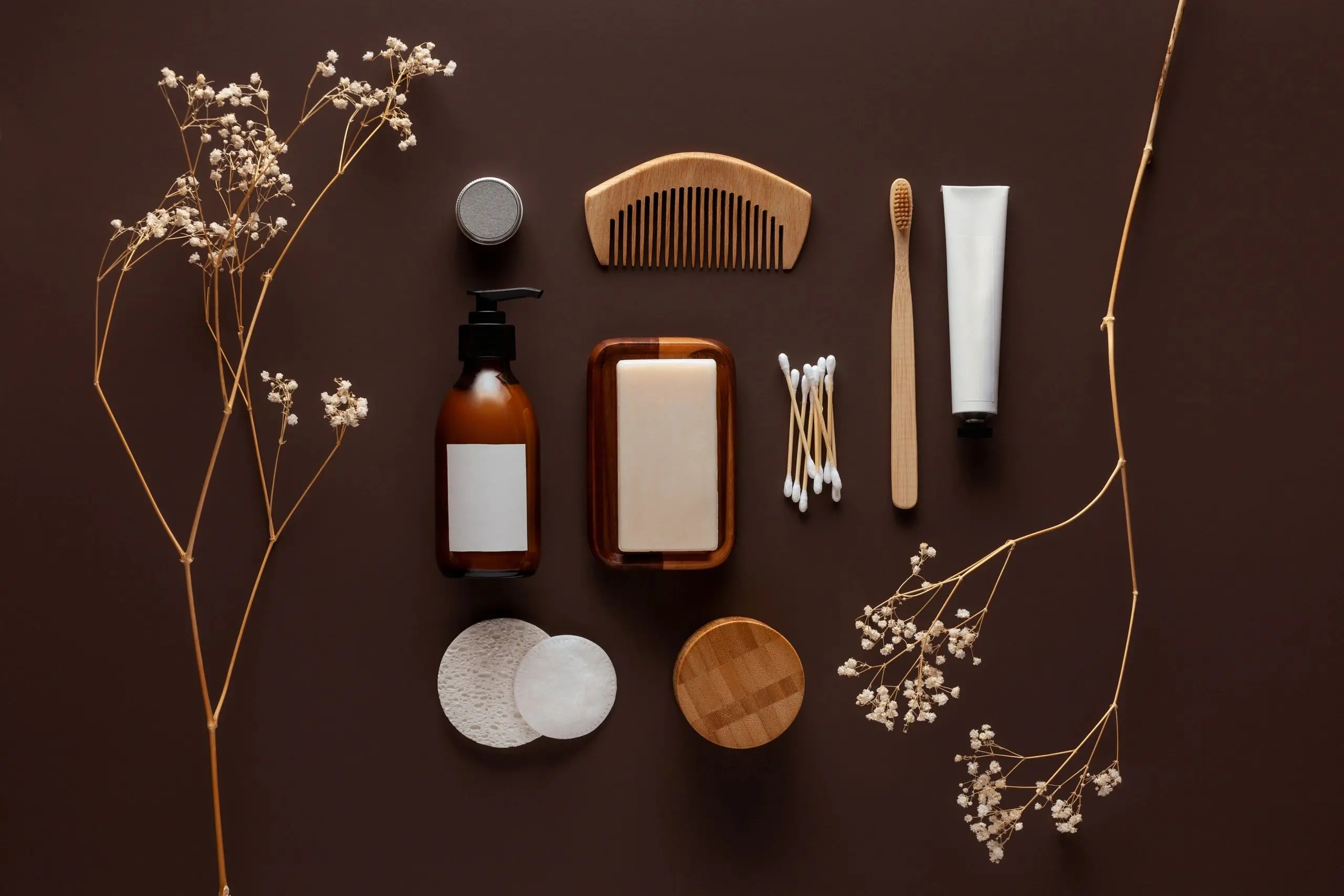 Beauty and body care products arranged in a flat lay