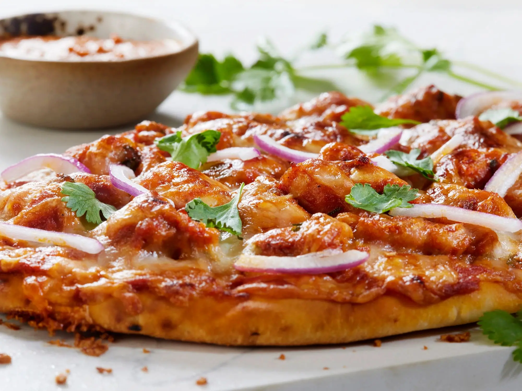 Pizza slice close up with toppings