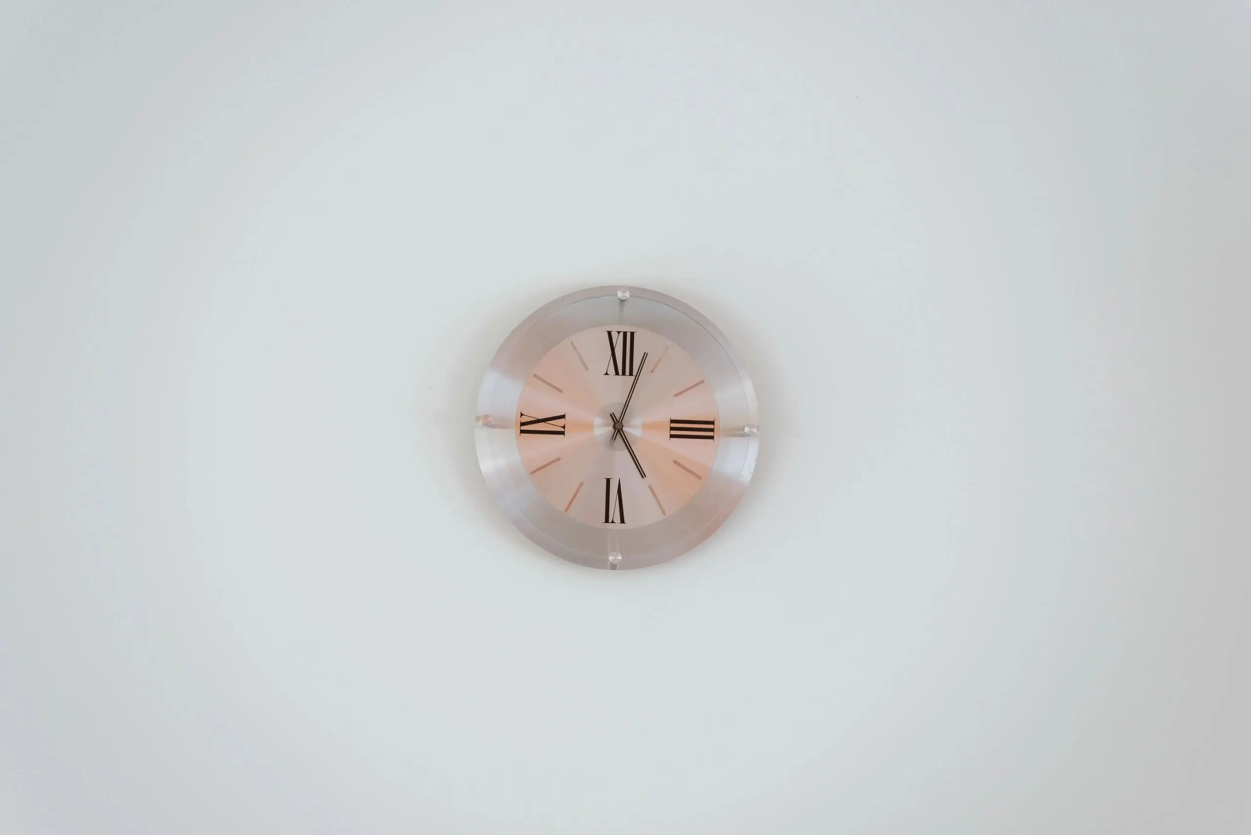 What Time Is It Wall clock on a clean white background