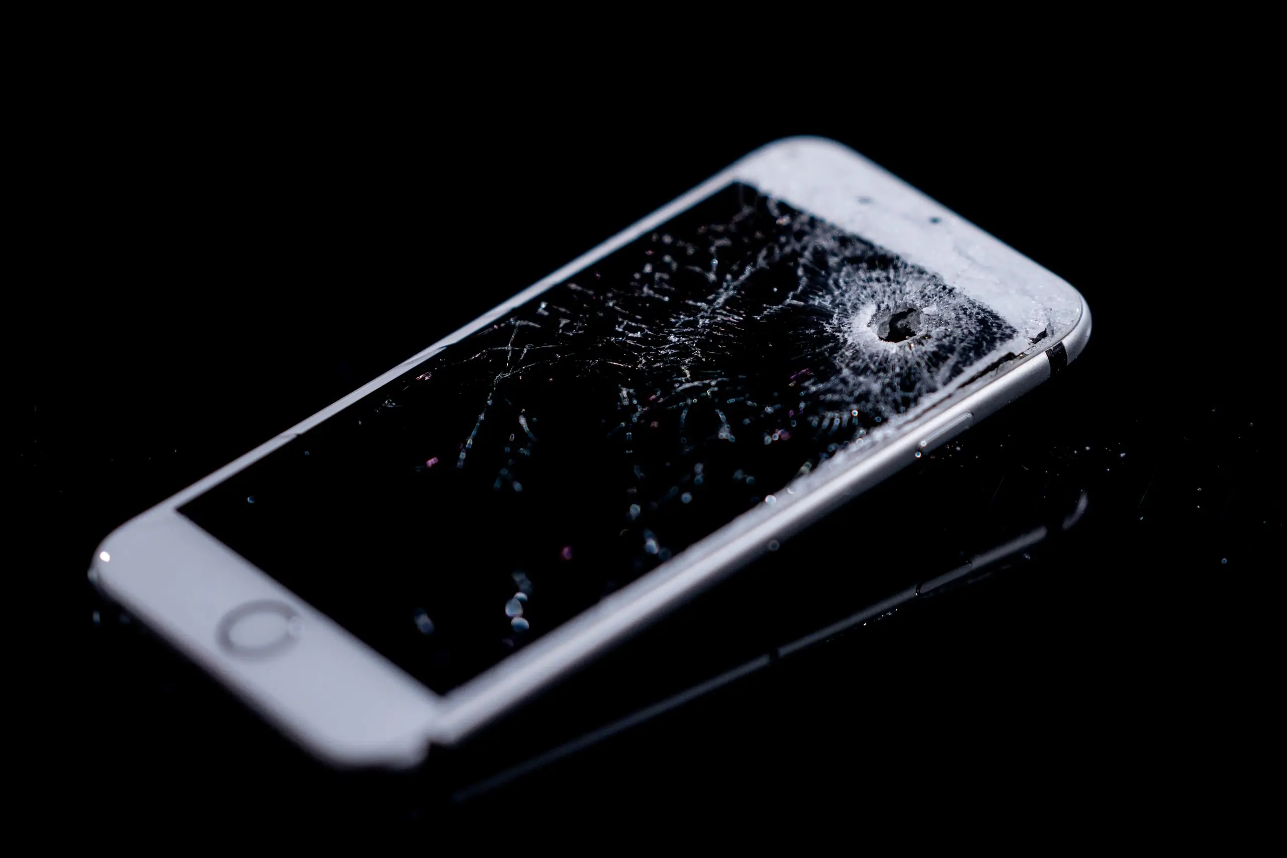 Damaged mobile phone close-up