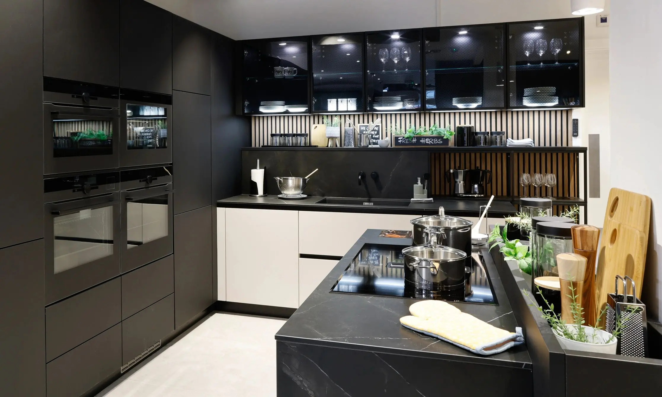 Elegant modern kitchen with built-in appliances and island