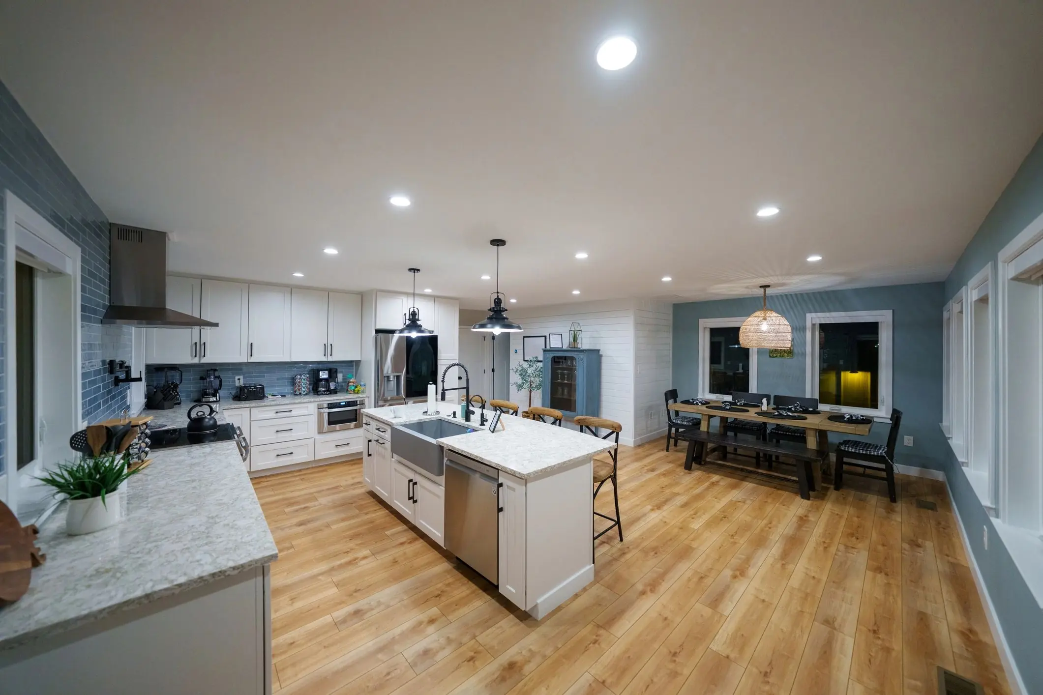Modern farmhouse kitchen and dining room with dining table