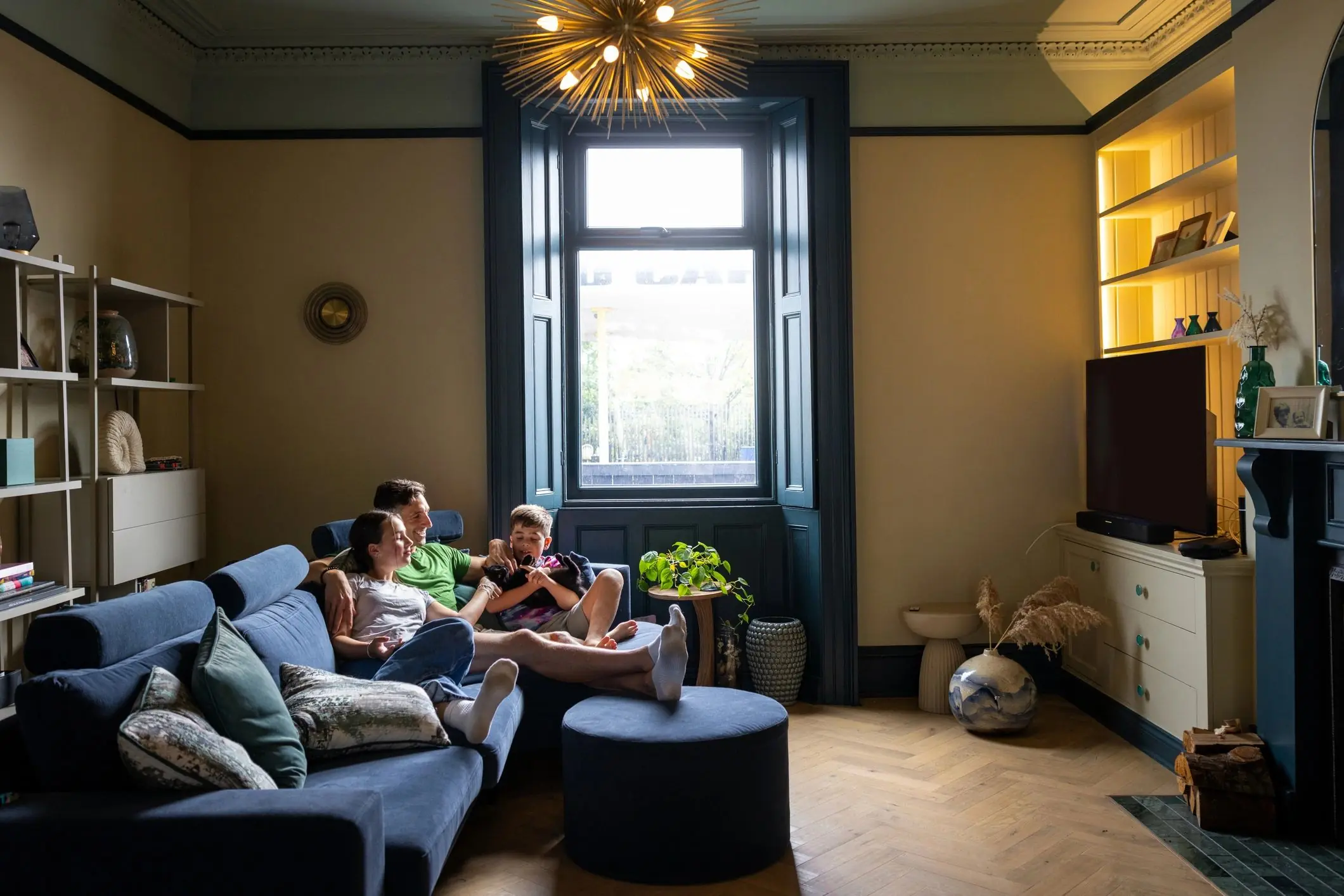 Family watching streaming TV together