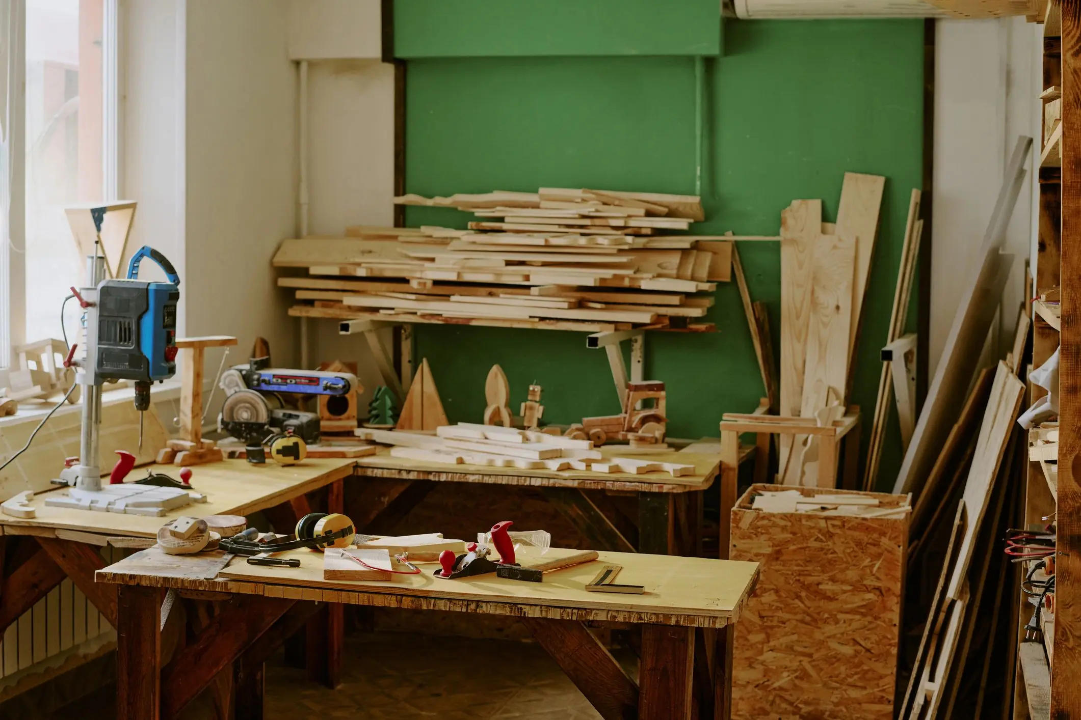 Woodworking shop with lumber and power tools